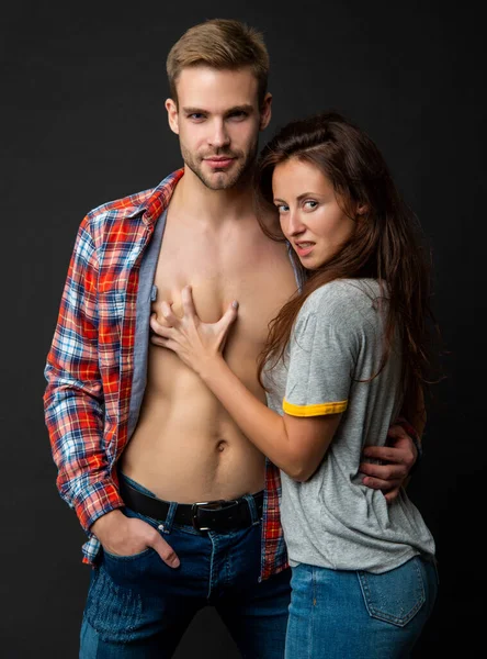 Sexy young couple in love feel desire on black background, togetherness — Stock Photo, Image