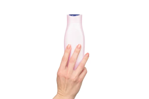 Female hands hold liquid soap bottle with copy space. — Stock Photo, Image