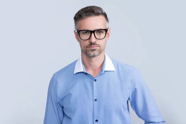 Serious mature lawyer wearing glasses and office shirt — Stockfoto