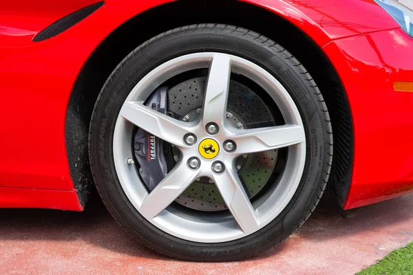 Miami Beach, Florida USA - April 15, 2021: red Ferrari wheel tike with car brand — 스톡 사진