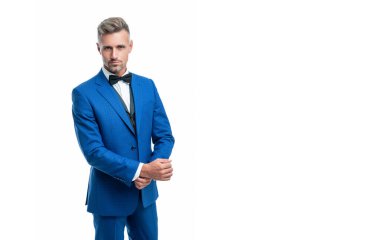 grizzled elegant man waiter with bow tie isolated on white background