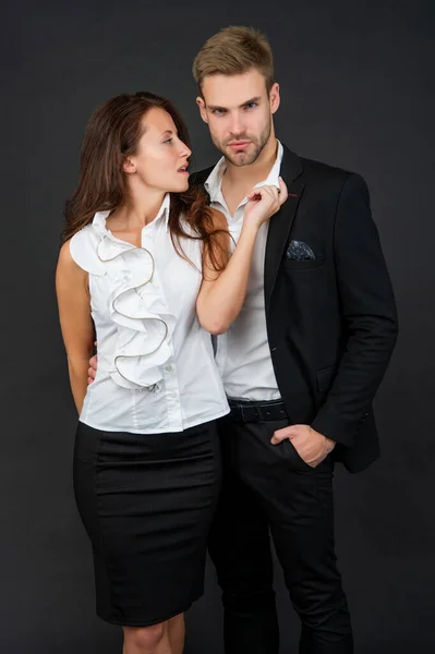 Colleague experts. man and brunette woman leadership. business partners on black background — Stock Fotó