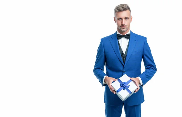 Man in blue tux with business reward box isolated on white — Stockfoto