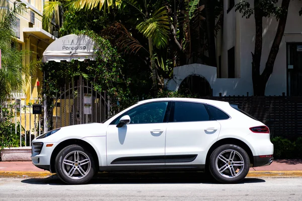 Miami Beach, Florida USA - April 14, 2021: white porsche, side view. parked luxury car — Zdjęcie stockowe
