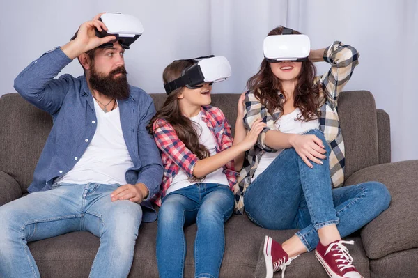 Father mother and child wireless glasses. virtual reality family. — Foto de Stock