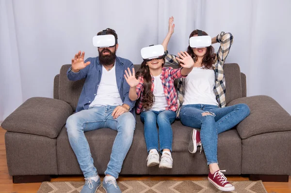 Amazed mother father and daughter in virtual reality glasses, innovation — Foto de Stock