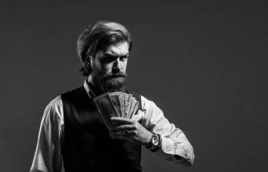Zengin adam parayı elinde tutar. Parasal başarı, gizli servis kavramı.