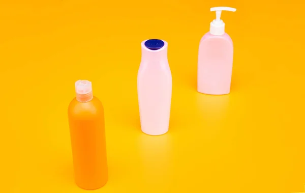 Multicolor refillable cosmetic packaging for bodywash products, bottles — Stock Photo, Image