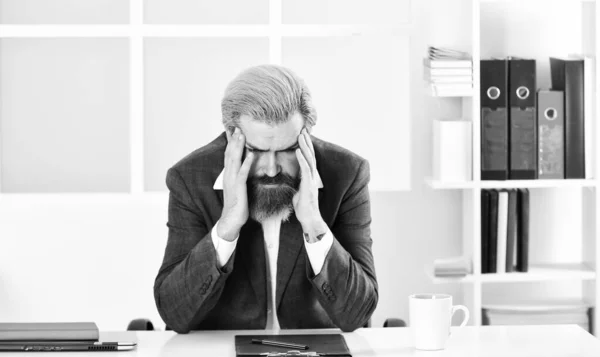 hard working day. employee during working day in office. working from home during a virus epidemic. Portrait of a handsome CEO. Busy mature man in office. Businessman. businessman in office