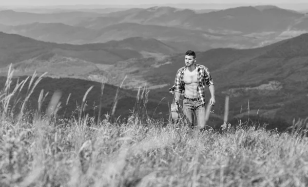 inspiration. sexy man with guitar in checkered shirt. hipster fashion. western camping and hiking. happy and free. cowboy man with bare muscular torso. acoustic guitar player. country music song.