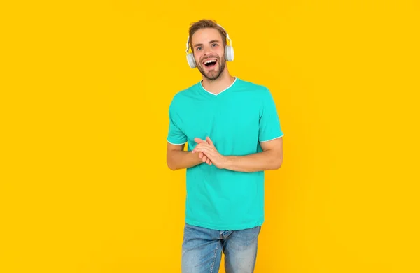 Happy Man Blue Shirt Wear Earphones Yellow Background Music — Stockfoto