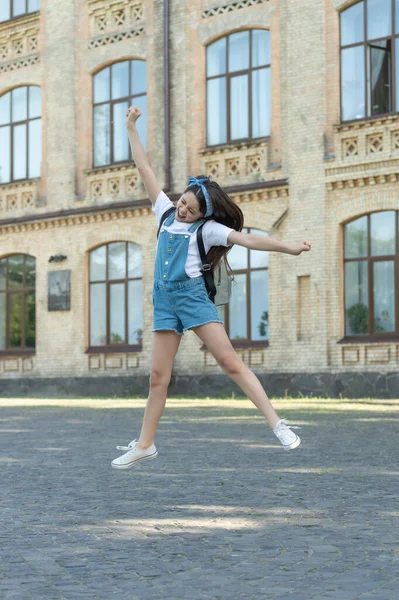 Happy Glad Girl Backpack Jumping Outdoor — Zdjęcie stockowe