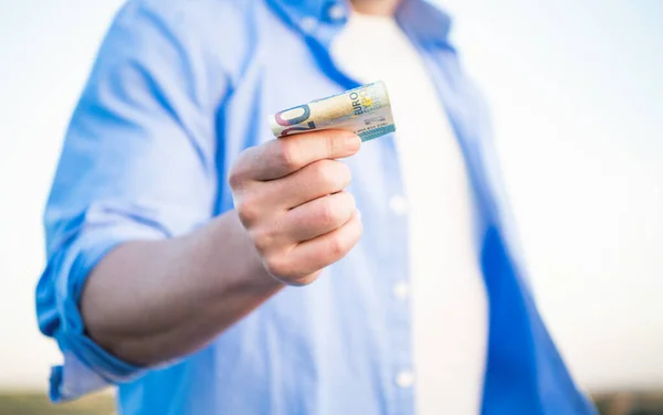 Blur Man Giving Cash Money Banknotes Selective Focus Outdoors Stock Picture
