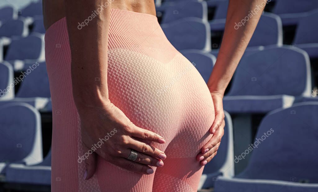 Lady Has Tight Ass Sportive Woman Sportswear Sexy Woman Stadium Stock Photo  by ©stetsik 645487494