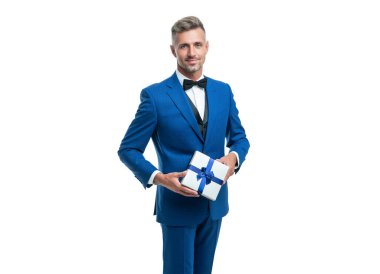 cheerful man hold gift box for mens or womens day.