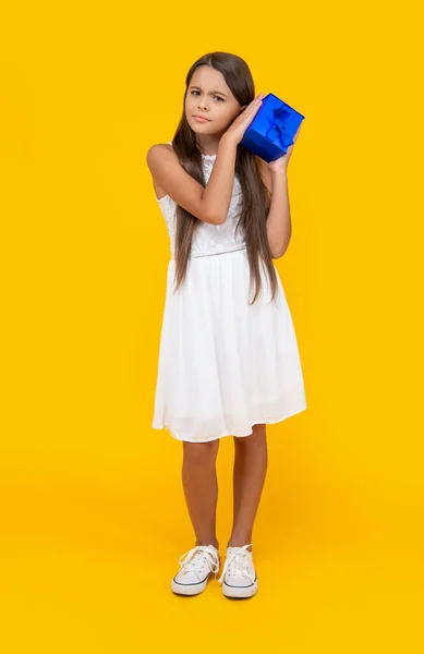 Curious Teen Girl Hold Present Box Yellow Background — Stock Photo, Image