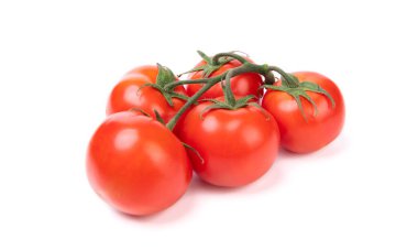 Organic red cherry tomato cluster isolated on white.