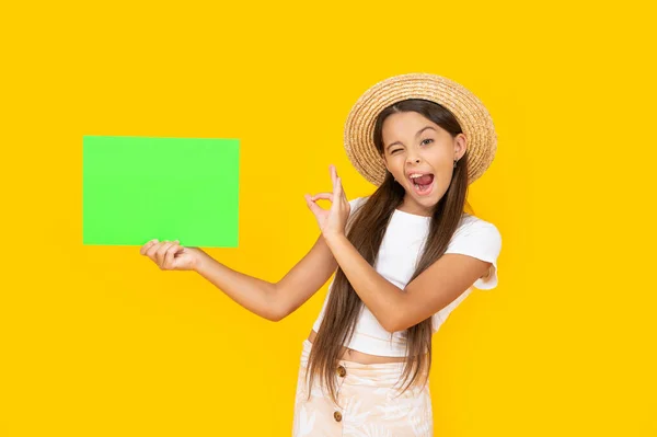 Winking Teen Girl Copy Space Green Paper Yellow Background — Photo
