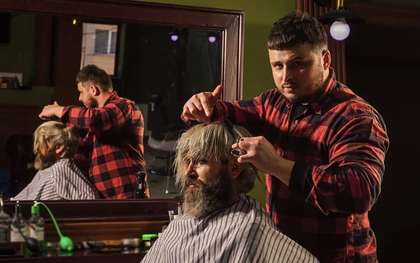 Guy with dyed hair. Short hair is not always less work than long hair. Donation and charity concept. Barber hairstyle barbershop. Hipster getting haircut. Professional cosmetics. Scissors cutting.