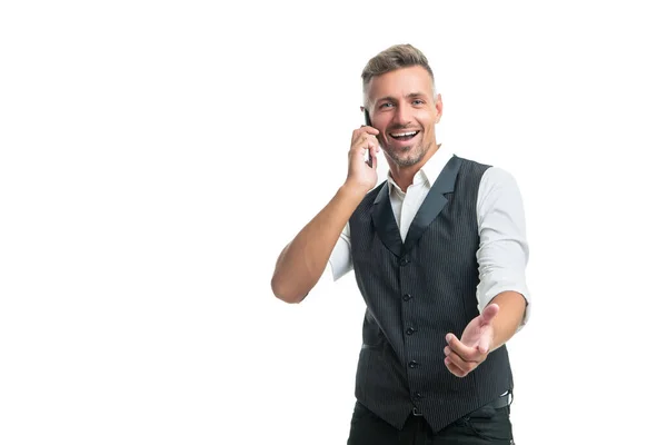 Happy Businessman Suit Vest Talking Mobile Phone Pointing Finger Isolated — Φωτογραφία Αρχείου