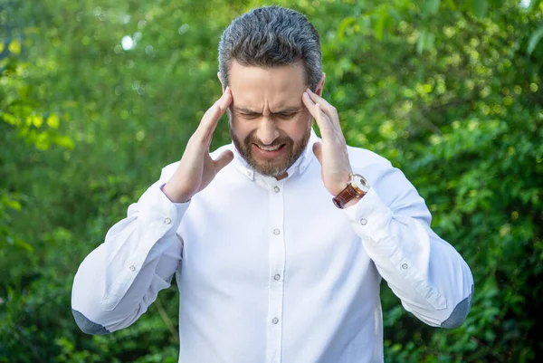 Stressed Businessman Suffering Migraine Attack Natural Background Headache — ストック写真