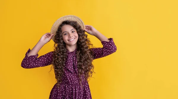 Glad Child Straw Hat Long Brunette Curly Hair Yellow Background — Stockfoto