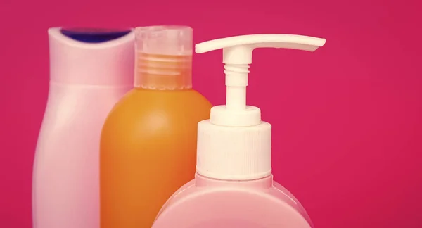 Leakproof Closeup Pump Flip Cap Bottles Cosmetic Bottles Pink Background — Stock Photo, Image