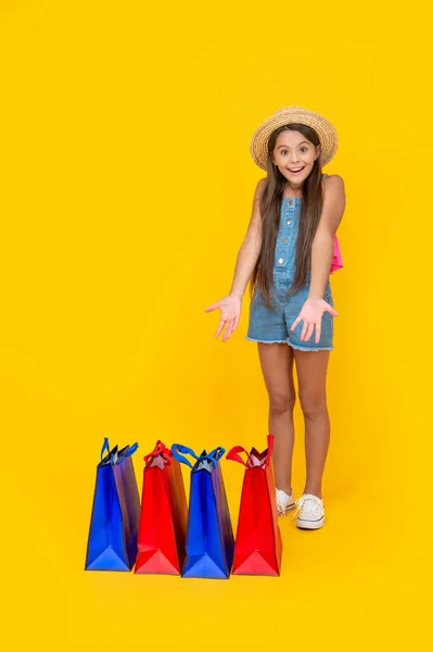 Surprised Teen Child Shopping Bags Yellow Background Full Length Copy — Stock fotografie