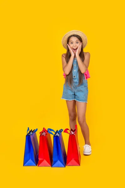 Amazed Teen Girl Shopping Bags Yellow Background Copy Space — 图库照片