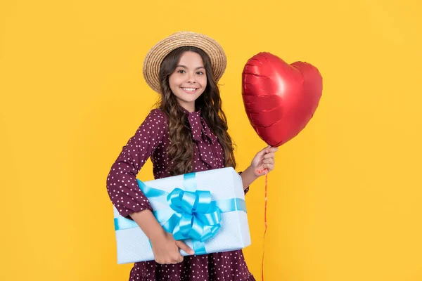 Teen Girl Smile Red Heart Balloon Present Box Yellow Background — стоковое фото