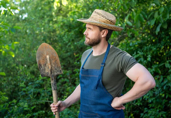 Serious Rural Man Farmers Hat Gardening Apron Looking Distance Holding — Stockfoto