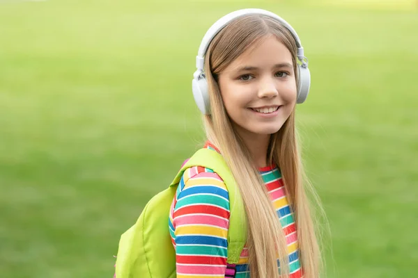 Happy Teen Girl Headphones Back School Carrying Backpack Outdoors — Foto de Stock