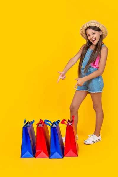 Happy Teen Girl Shopping Bags Yellow Background Full Length Copy — Stock fotografie
