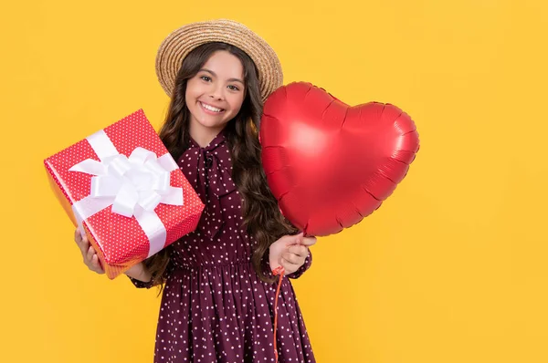 Glad Teen Girl Red Heart Balloon Present Box Yellow Background — стоковое фото