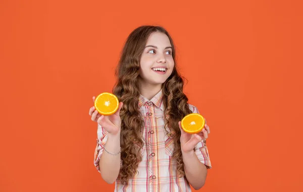 Positive Teen Child Hold Citric Fruit Orange Background — Φωτογραφία Αρχείου