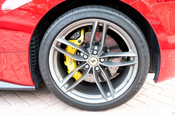 Miami Beach, Florida USA - April 18, 2021: ferrari car detail of wheel and tire.