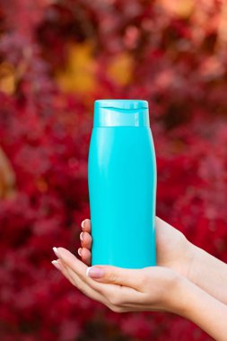 unbranded shower gel bottle with copy space.