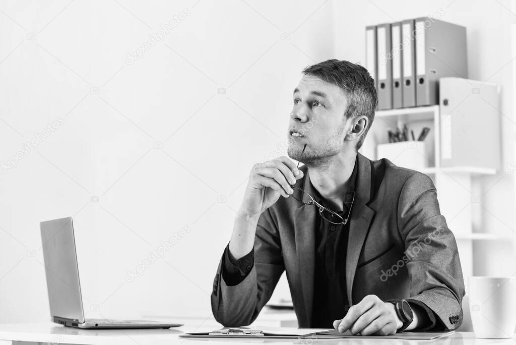 Busy man in modern workplace. boss or employee. being professional secretary. skilled and successful ceo. young businessman working in office. male manager work on laptop. copy space.