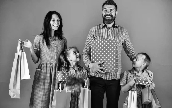 happy family go shopping together hold packages, shop.