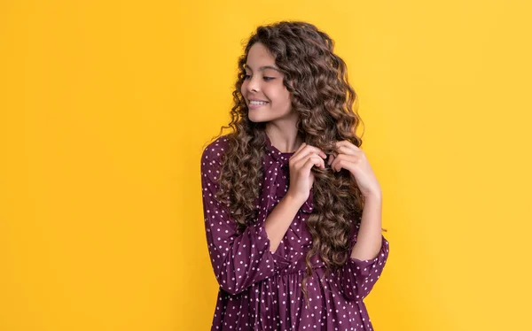 Child Smile Long Brunette Curly Hair Yellow Background — Photo