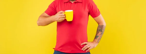 Man Crop View Holding Mug Keeping Arm Akimbo Yellow Background — Stockfoto