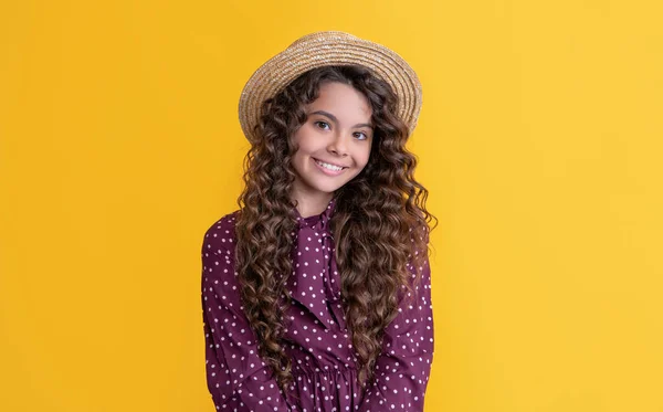 Cheerful Child Straw Hat Long Brunette Curly Hair Yellow Background —  Fotos de Stock