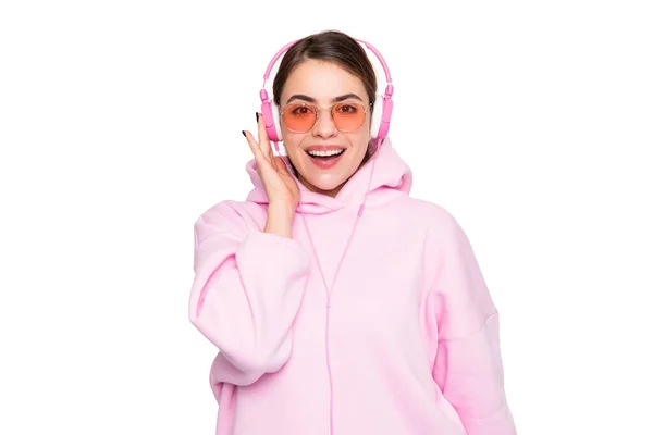 Happy Young Woman Pink Hoodie Glasses Listening Music Headphones Isolated — ストック写真