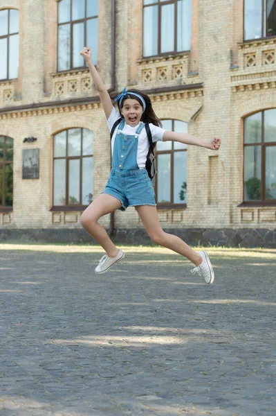 Surprised Denim Girl Backpack Jumping Outdoor — Stok fotoğraf