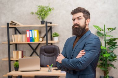 serious bearded businessman wear suit crossed hands in the office with copy space, formalwear.
