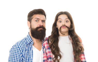 Moustache is under your nose. Father with moustache and beard hair and little daughter with long hair. Bearded man with beard and natural moustache and small girl making fake moustache with her hair.