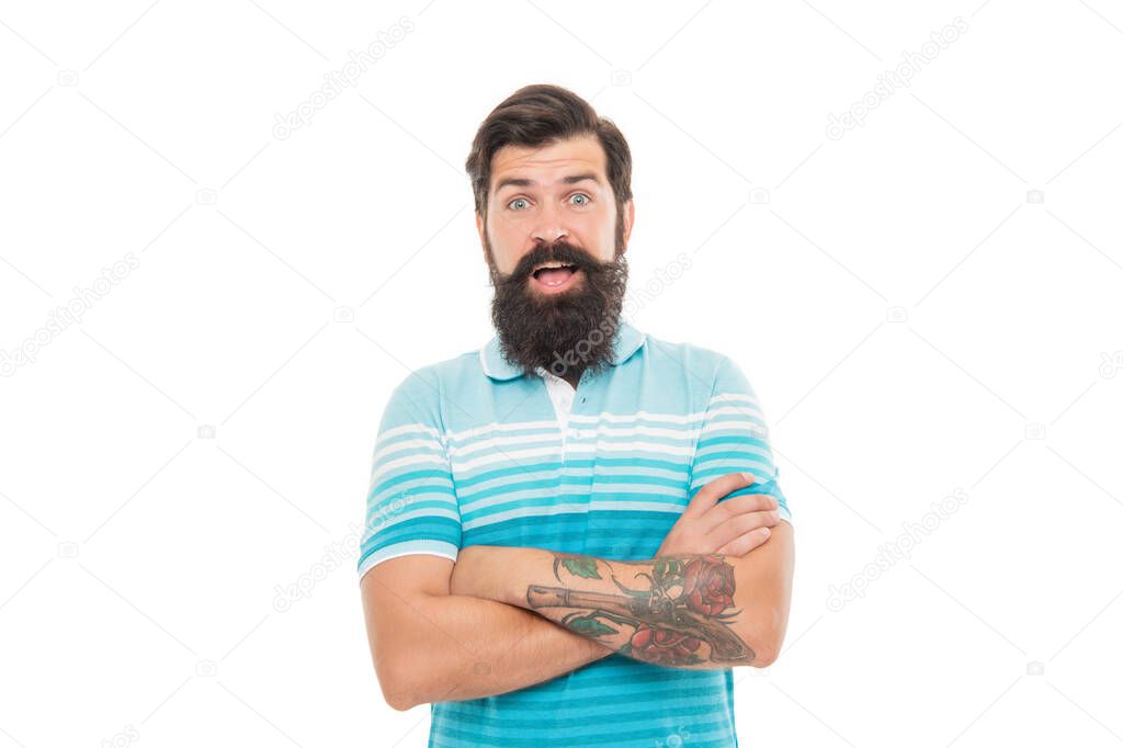 Surprised man isolated on white. Unshaven man jaw dropped with surprise. Bearded man keeping arms crossed.