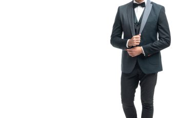 man bridegroom in rich tux bow isolated on white background. full lentgh.