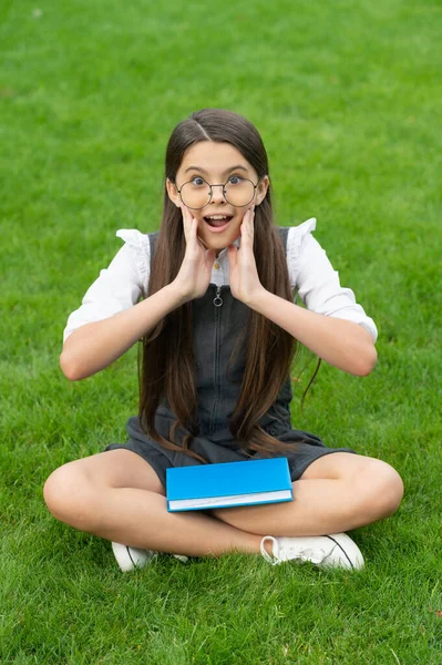 Shocked Teen School Girl Sitting Legs Crossed Grass School Education — Stockfoto