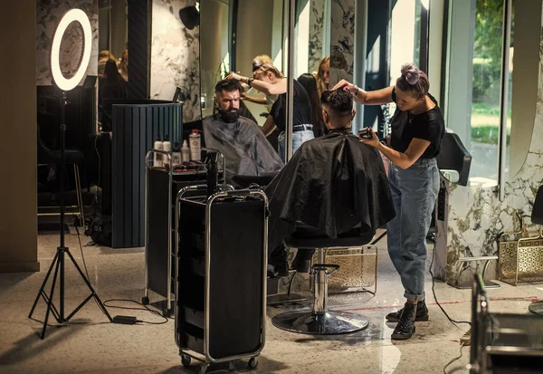 Morning routine. brutal hipster with moustache making new hairstyle. barbershop. male trendy hairdo. perfect haircut with blade razor. barber master cut hair. mature hipster with beard at hairdresser.